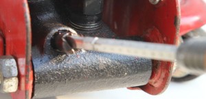 loosen the filler plug with a flat head screwdriver